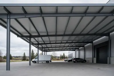 Steel-frame canopy with insulated roof panels and a finished light grey underside